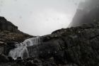 up_the_falls_below_Mirror_Lake_w_per__light_rain_falling~0.jpg
